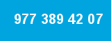 977 389 42 07